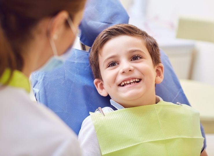 boy-smiling-in-dentist-chair